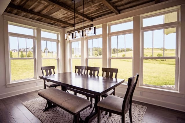 dining room with full window surround