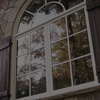 Infinity replacement casement window with roundtop