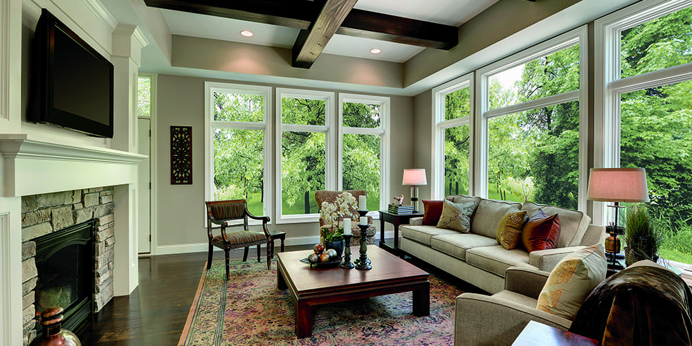 Marvin Essential Picture Windows and Casement in Cashmere with Satin Nickel hardware.