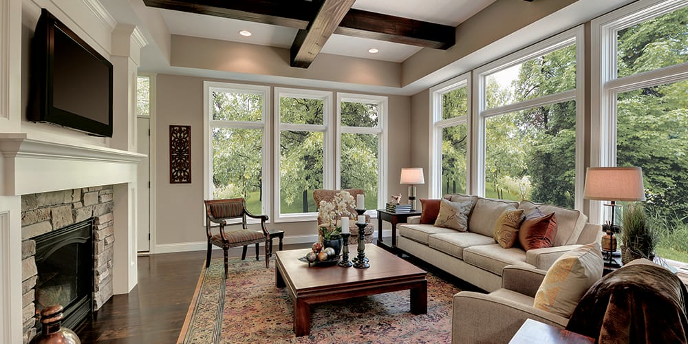 Marvin Essential Picture Windows and Casement in Cashmere with Satin Nickel hardware.